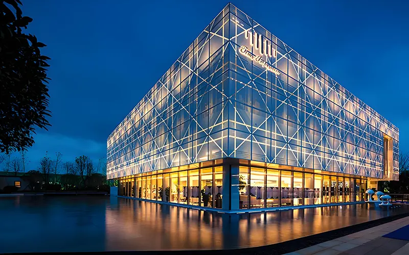 Modern architectural facade lighting design highlighting building exterior with LED linear lights