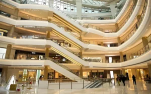 Modern shopping mall lighting design with energy-efficient LED lights and bright retail spaces
