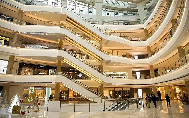 Modern shopping mall lighting design with energy-efficient LED lights and bright retail spaces
