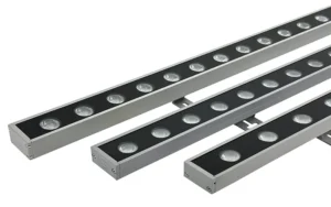 Outdoor LED wall washer illuminating architectural building facade with even color lighting
