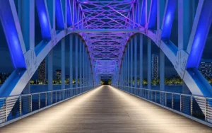 Bridge lighting illuminating a bridge at night