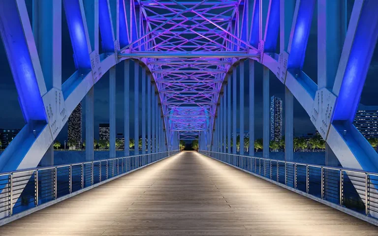 Bridge lighting illuminating a bridge at night
