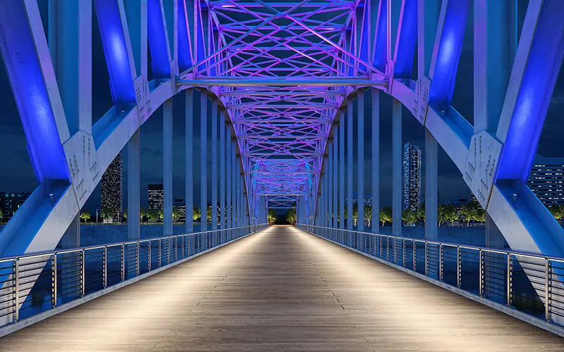Bridge lighting illuminating a bridge at night